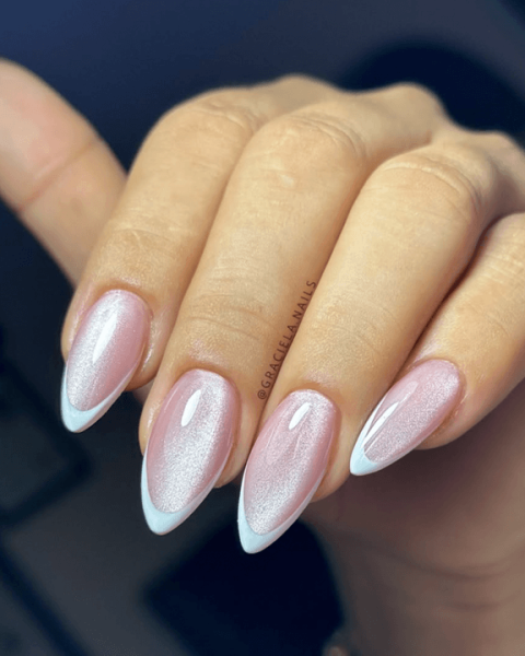 Close up of a velvet baby pink french manicure